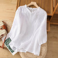 Sol – blusa bordada con botones