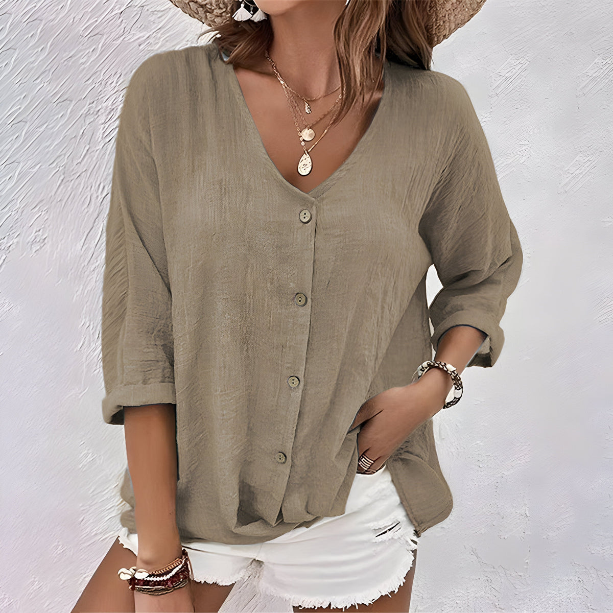 Herminia – blusa holgada de botones con escote en v