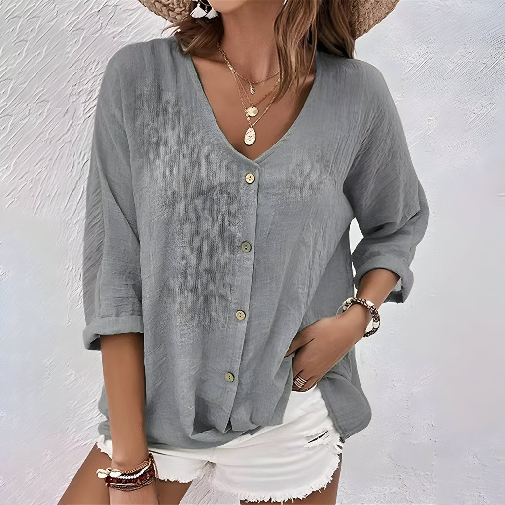 Herminia – blusa holgada de botones con escote en v